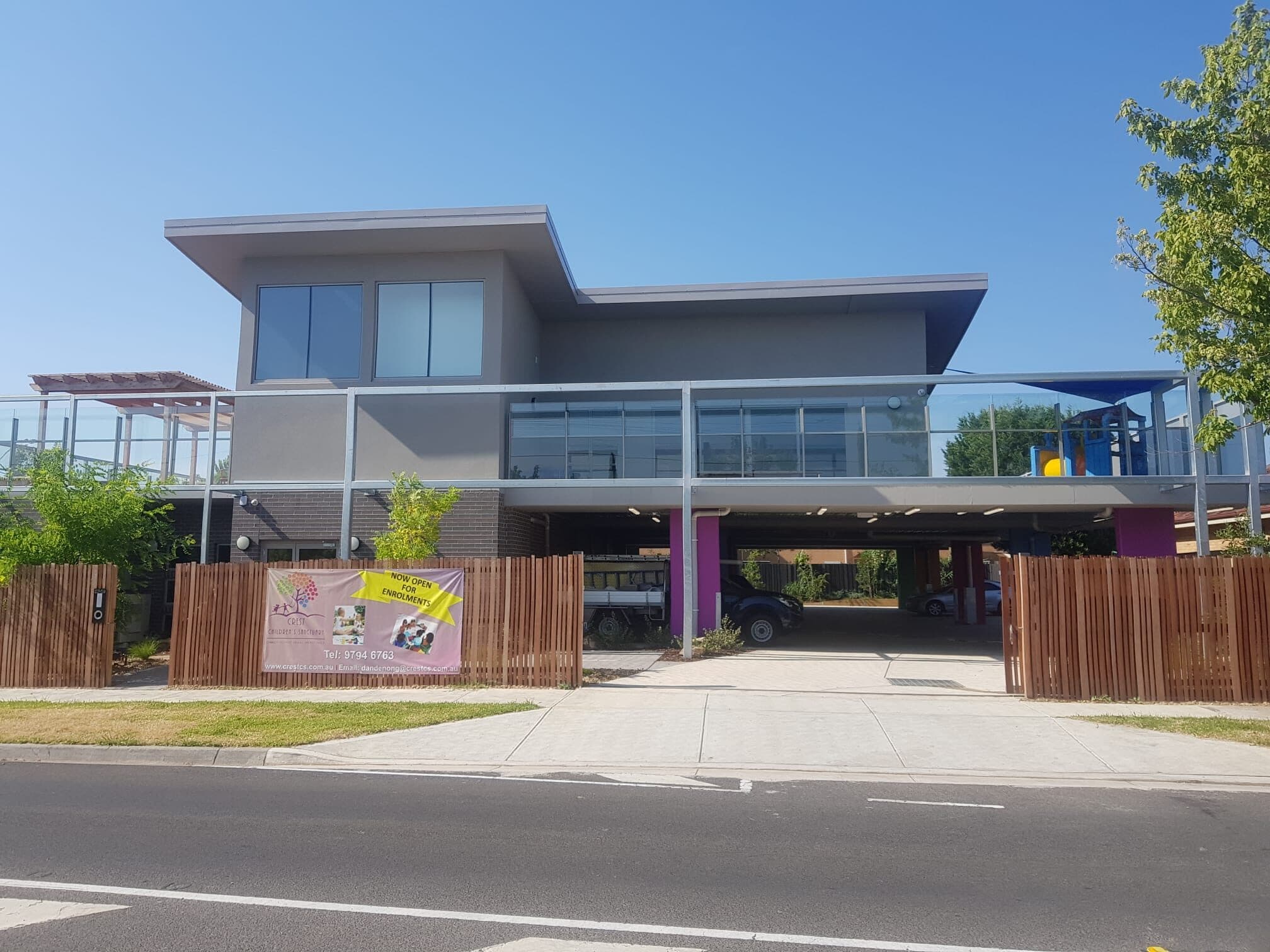 A modern two-storey childcare centre in Fairfield under a clear sky, fitted out by Climate Group