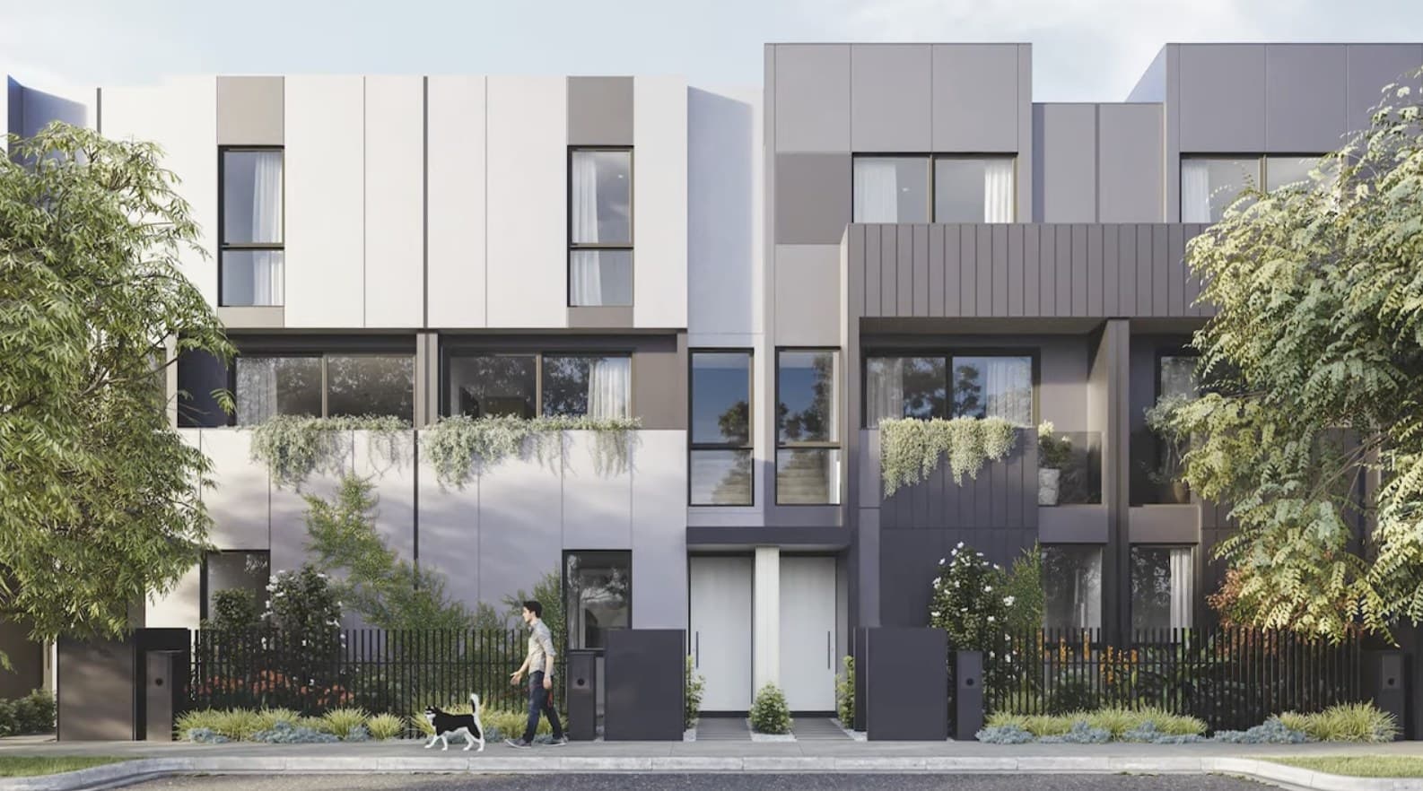 Architectural render of the Wattle House front elevation, mixed render and metal cladding across two- and three-storey townhomes